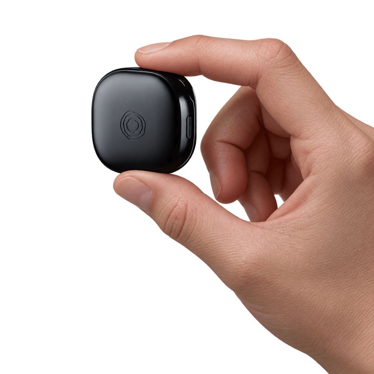 The black Buddi wearable held between a thumb and finger to illustrate its compact size.